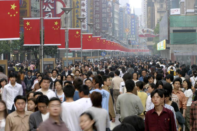 Crowds line the centeral shopping district of Nanjing Road on May Day Weekend in Shanghai
